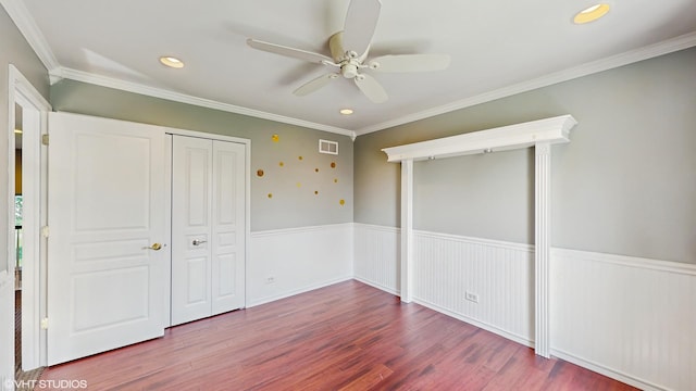 8 Georgetown Ct, Algonquin, IL 60102 - unfurnished bedroom with wood finished floors, recessed lighting, crown molding, a wainscoted wall, and ceiling fan