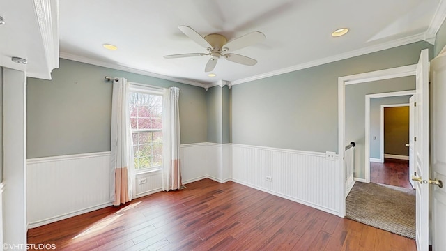8 Georgetown Ct, Algonquin, IL 60102 - unfurnished room with hardwood / wood-style floors, wainscoting, a ceiling fan, and crown molding