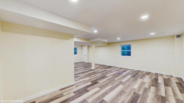 8 Georgetown Ct, Algonquin, IL 60102 - finished below grade area with light wood-type flooring, recessed lighting, and baseboards