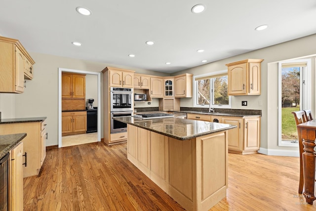 4302 Fox Creek Dr, Crystal Lake, IL 60012 - kitchen featuring stainless steel double oven, light brown cabinets, a sink, gas stovetop, and recessed lighting