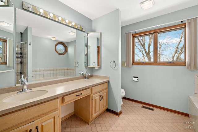 4302 Fox Creek Dr, Crystal Lake, IL 60012 - full bathroom with a garden tub, double vanity, toilet, baseboards, and a shower