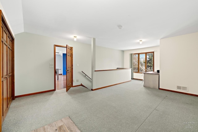 4302 Fox Creek Dr, Crystal Lake, IL 60012 - spare room featuring baseboards and light carpet