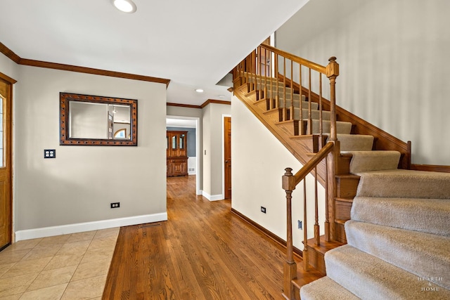 4302 Fox Creek Dr, Crystal Lake, IL 60012 - foyer entrance featuring baseboards, crown molding, stairway, recessed lighting, and light wood-style floors