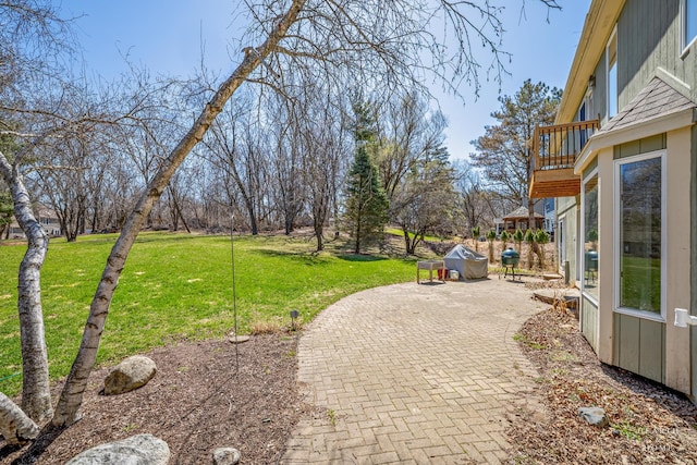 4302 Fox Creek Dr, Crystal Lake, IL 60012 - view of green lawn featuring a patio and a balcony