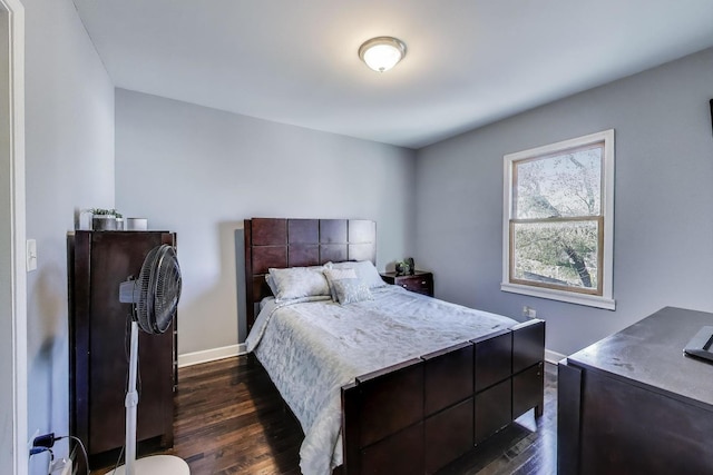 5030 W 22nd Pl, Cicero, IL 60804 - bedroom with dark wood finished floors and baseboards