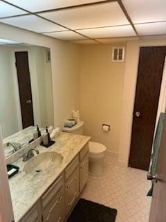 75 6th Ave Unit 209, La Grange, IL 60525 - bathroom with toilet, vanity, tile patterned flooring, and a drop ceiling