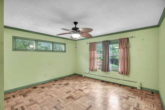 2109 Grange Dr, Urbana, IL 61801 - unfurnished room with a baseboard radiator, plenty of natural light, ceiling fan, and crown molding