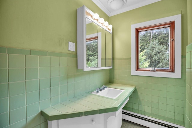 2109 Grange Dr, Urbana, IL 61801 - bathroom featuring a baseboard heating unit, plenty of natural light, tile walls, vanity, and ornamental molding