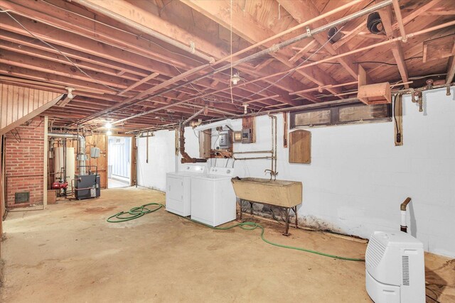 2109 Grange Dr, Urbana, IL 61801 - below grade area featuring independent washer and dryer and a heating unit