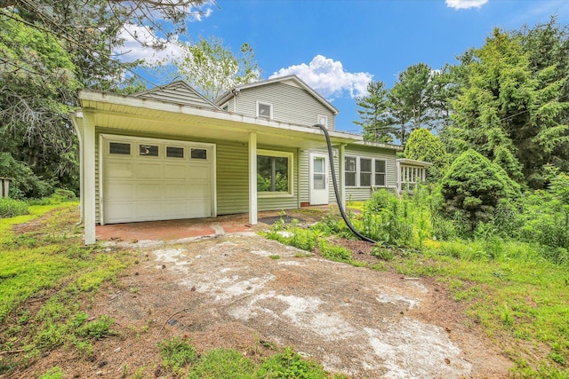 2109 Grange Dr, Urbana, IL 61801 - single story home with a garage and dirt driveway