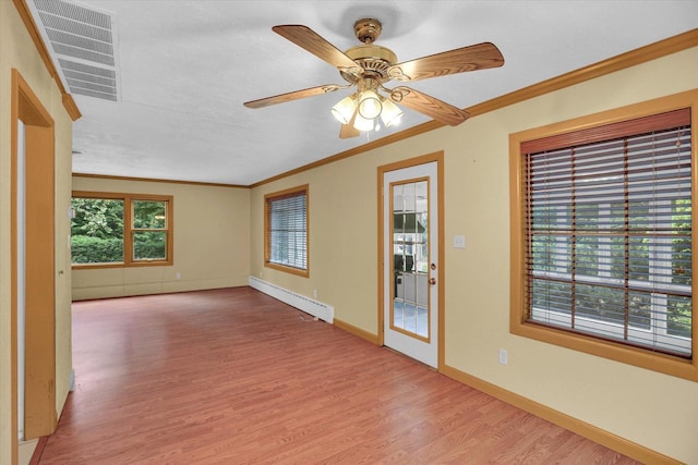 2109 Grange Dr, Urbana, IL 61801 - spare room with light wood finished floors, crown molding, ceiling fan, and baseboard heating