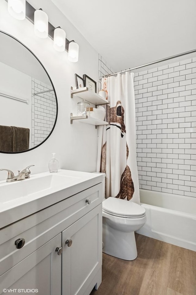6171 N Sheridan Rd Unit 2704, Chicago, IL 60660 - full bath featuring toilet, wood finished floors, vanity, and shower / bath combination with curtain