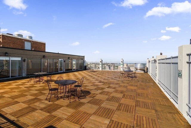 6171 N Sheridan Rd Unit 2704, Chicago, IL 60660 - view of patio / terrace with outdoor dining area and a water view