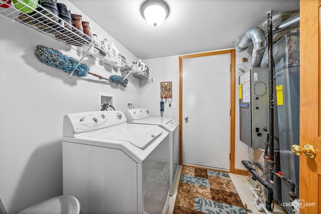 laundry room with separate washer and dryer