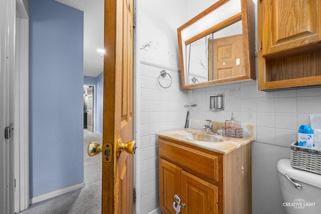 1020 Hahn Pl, West Chicago, IL 60185 - bathroom with toilet, vanity, and backsplash