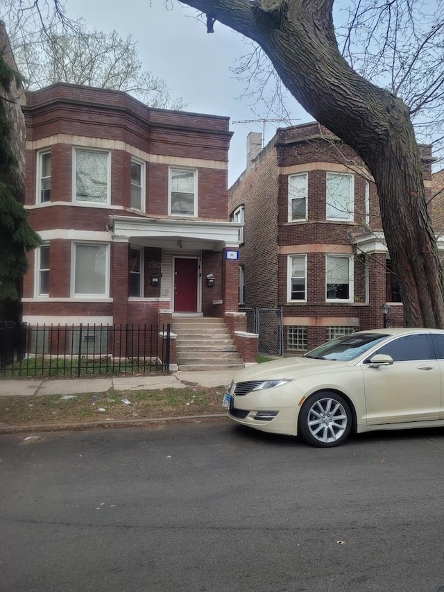 7542 S Peoria St, Chicago, IL 60620 - view of front of house featuring brick siding