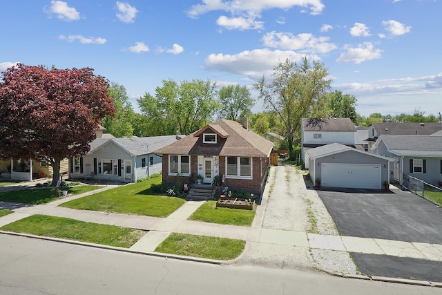 1009 W Madison St, Ottawa, IL 61350 - view of front facade featuring brick siding, a front yard, and a residential view