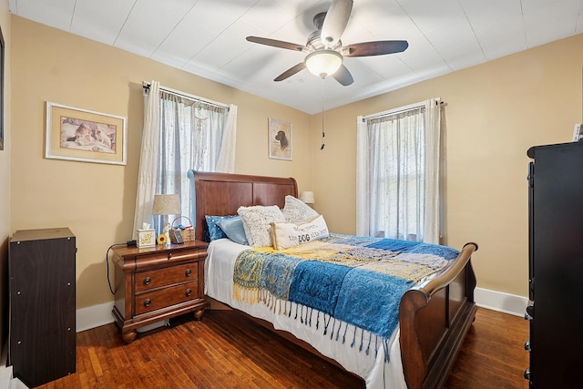 1009 W Madison St, Ottawa, IL 61350 - bedroom featuring multiple windows, hardwood / wood-style flooring, and baseboards