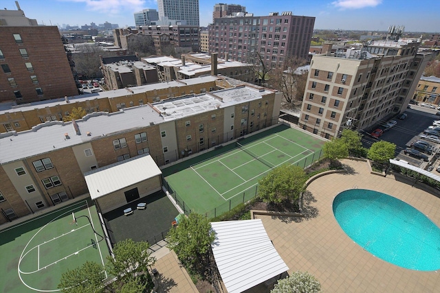 view of urban area featuring a pool area
