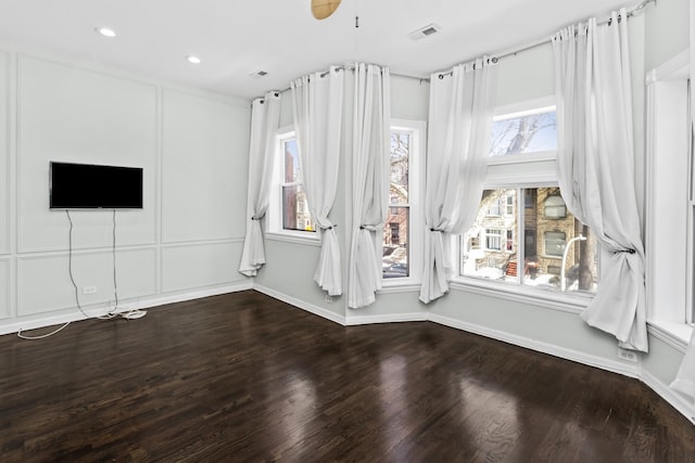 4738 S Champlain Ave, Chicago, IL 60615 - spare room featuring wood finished floors, recessed lighting, and baseboards