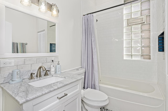 4738 S Champlain Ave, Chicago, IL 60615 - full bath featuring toilet, vanity, shower / bath combination with curtain, and plenty of natural light