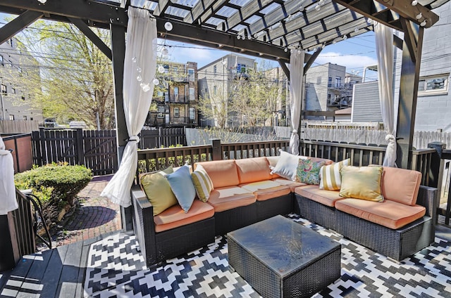 4738 S Champlain Ave, Chicago, IL 60615 - wooden deck with outdoor lounge area, a fenced backyard, and a pergola