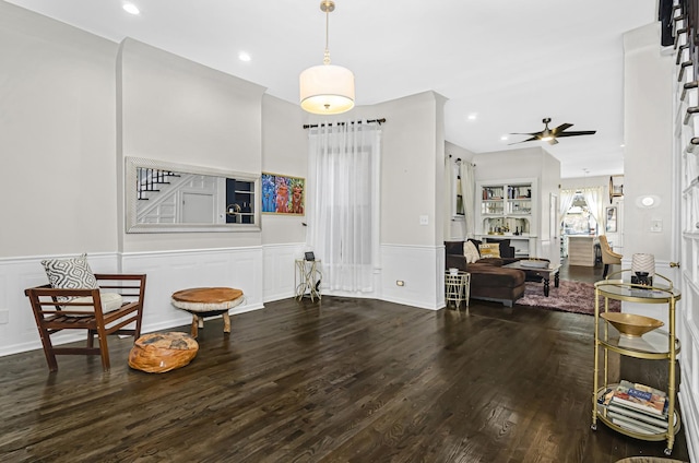 4738 S Champlain Ave, Chicago, IL 60615 - living area with wood finished floors, a ceiling fan, wainscoting, recessed lighting, and a decorative wall