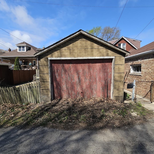 garage featuring fence