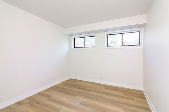 2212 Country Club Dr Unit 2, Woodridge, IL 60517 - basement with light wood-style flooring and baseboards