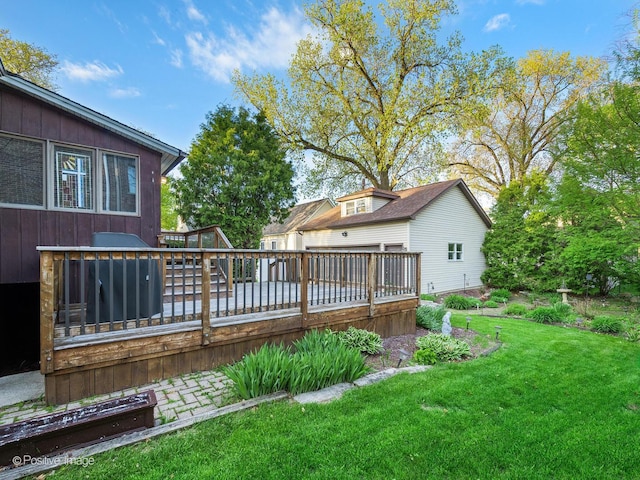 view of grassy yard featuring a deck