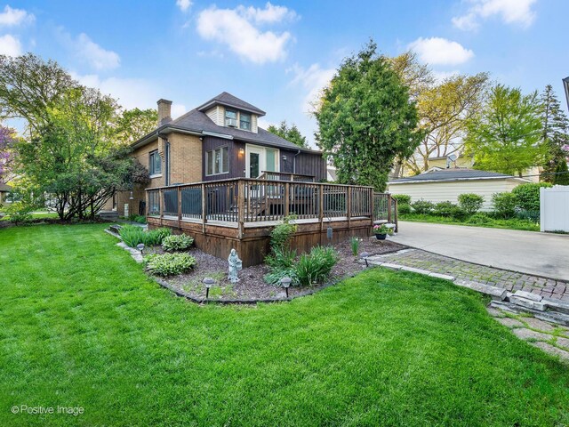 375 S Berkley Ave, Elmhurst, IL 60126 - rear view of property with a wooden deck, a chimney, a yard, and brick siding