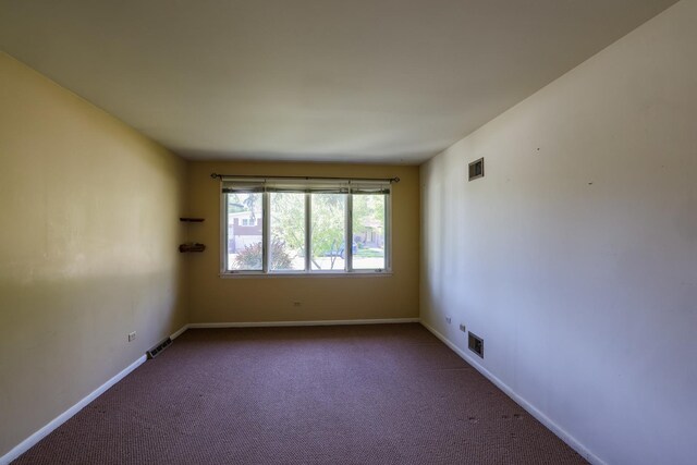 18727 Sherman St, Lansing, IL 60438 - carpeted spare room featuring baseboards