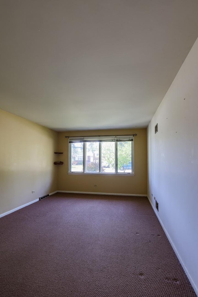 18727 Sherman St, Lansing, IL 60438 - carpeted empty room featuring baseboards