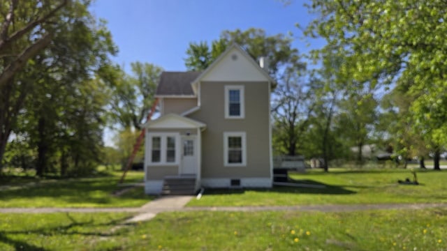 140 E Walnut St, Sheldon, IL 60966 - view of front of home with a front yard
