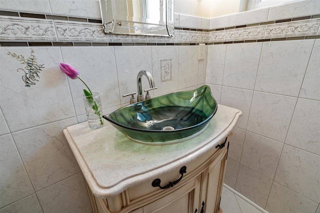 bathroom featuring tile walls and vanity