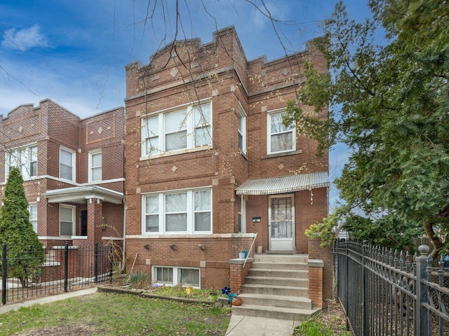 2552 N Austin Ave, Chicago, IL 60639 - view of front of house featuring brick siding