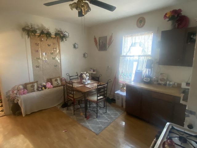 2552 N Austin Ave, Chicago, IL 60639 - dining area featuring ceiling fan and wood finished floors