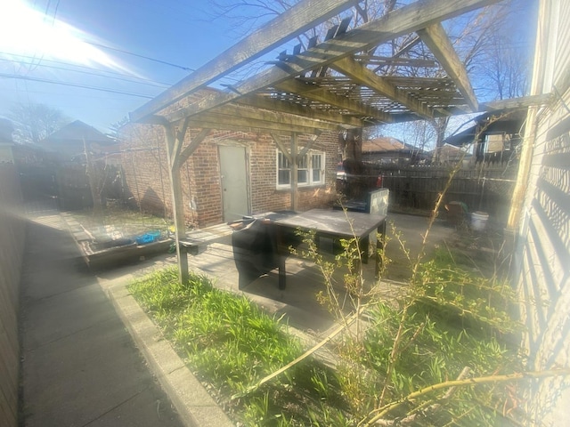 2552 N Austin Ave, Chicago, IL 60639 - view of patio with fence and a pergola