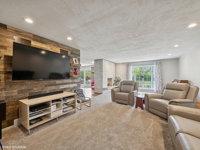 720 Ruskin Dr, Elk Grove Village, IL 60007 - living room with a textured ceiling, carpet flooring, recessed lighting, and a fireplace