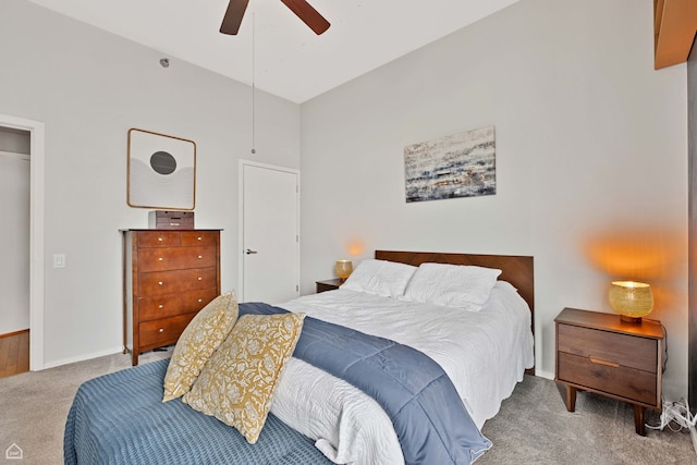 bedroom featuring carpet flooring, baseboards, and ceiling fan