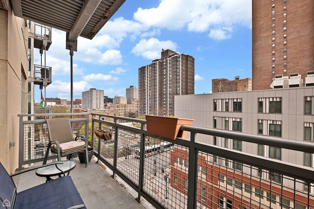 balcony featuring a city view
