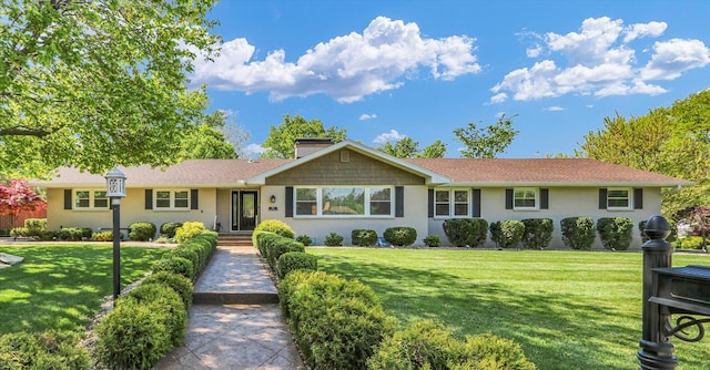 811 Hamilton Dr, Champaign, IL 61820 - ranch-style home featuring a front yard and a chimney