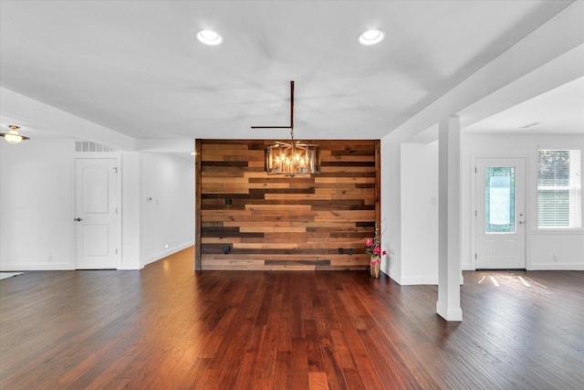 811 Hamilton Dr, Champaign, IL 61820 - unfurnished dining area with wood finished floors, a chandelier, baseboards, recessed lighting, and wooden walls