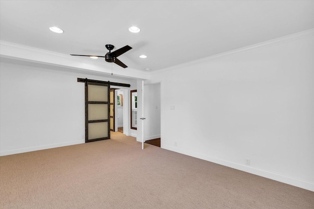 811 Hamilton Dr, Champaign, IL 61820 - unfurnished bedroom featuring a barn door, crown molding, recessed lighting, light colored carpet, and baseboards