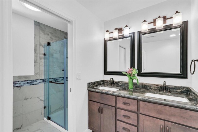 811 Hamilton Dr, Champaign, IL 61820 - full bathroom with marble finish flooring, a shower stall, double vanity, and baseboards