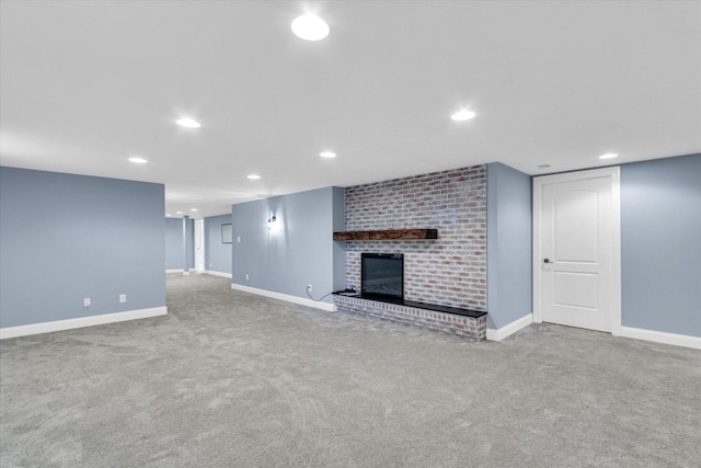 811 Hamilton Dr, Champaign, IL 61820 - unfurnished living room with carpet floors, a fireplace, baseboards, and recessed lighting