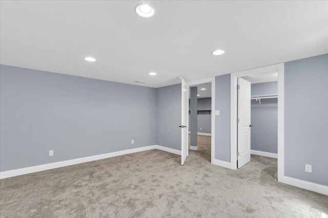 811 Hamilton Dr, Champaign, IL 61820 - unfurnished bedroom featuring carpet floors, recessed lighting, baseboards, and a spacious closet
