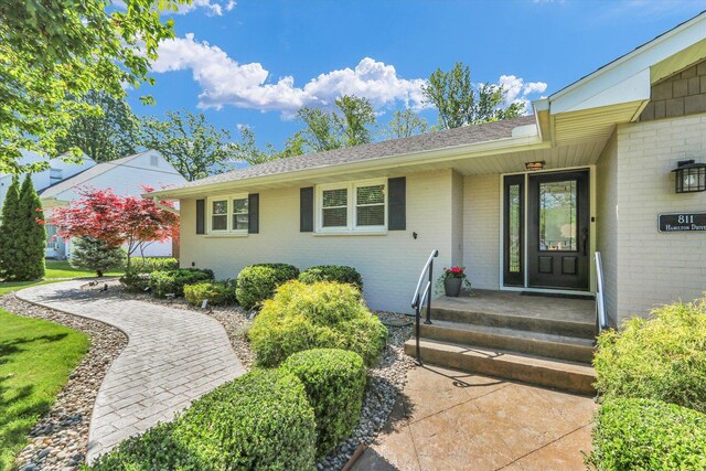 811 Hamilton Dr, Champaign, IL 61820 - entrance to property with brick siding and a shingled roof