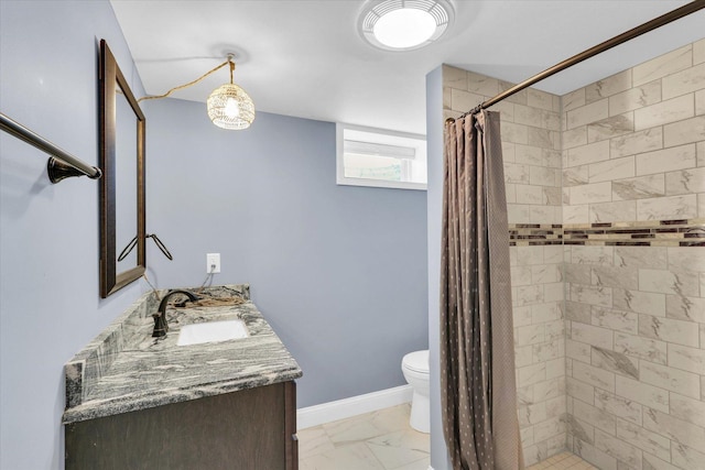 811 Hamilton Dr, Champaign, IL 61820 - full bathroom with toilet, a tile shower, vanity, marble finish flooring, and baseboards