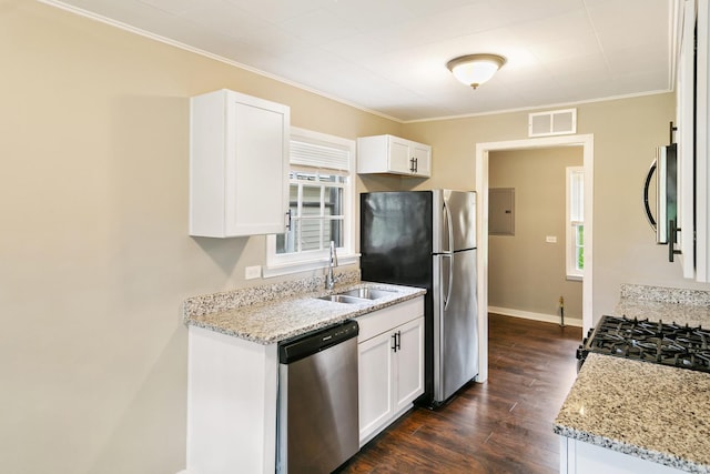 17725 Henry St, Lansing, IL 60438 - kitchen with appliances with stainless steel finishes, a sink, dark wood finished floors, healthy amount of natural light, and crown molding
